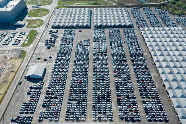 parking lot full with vehicles